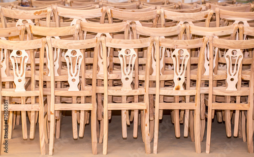 Wooden chairs warehouse in production. Manufacturing and repair of furniture. Furniture production  handmade wooden furniture. Industrial plant.