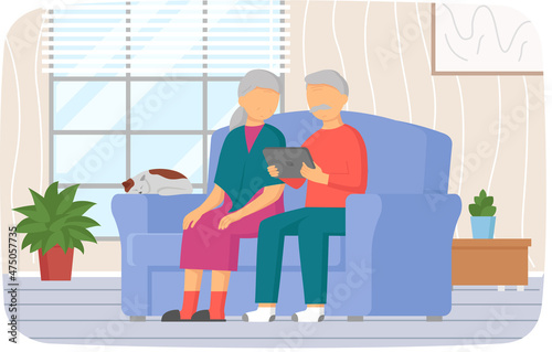 Old people playing game looking at screen. Senior couple sitting on couch and watching video on tablet. Education on computer, dealing with modern technology concept. Retired man and woman with gadget
