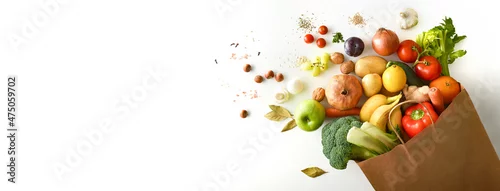 Panel kuchenny z motywem Background shopping bag with fruits and vegetables on white table