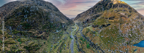 Aerial view of the winding roads at Gap of Dunloe in Ring of Kerry, a narrow mountain pass running north to south of county Kerry, Ireland photo