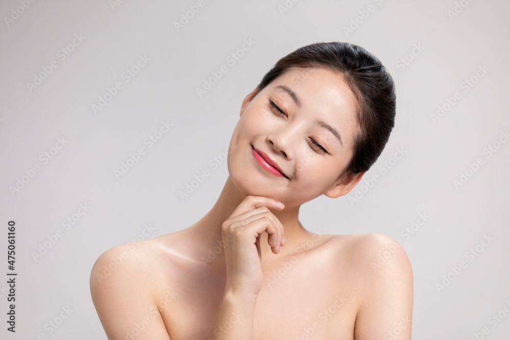 Studio shot of beautiful young woman Studio shot of beautiful young woman