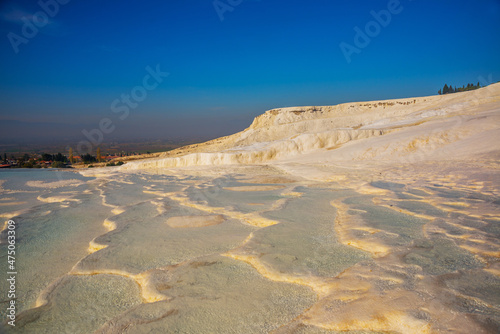 PAMUKKALE, TURKEY: Beautiful white travertine terraces on a sunny day.