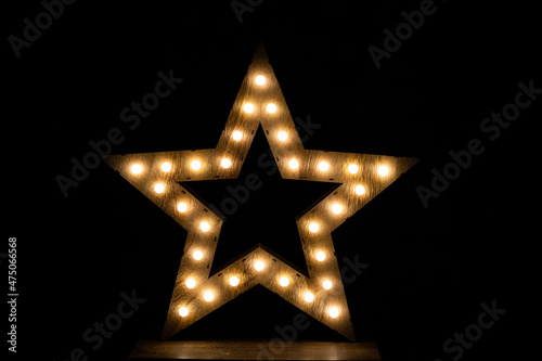 Wooden star with lights for christmas decoration