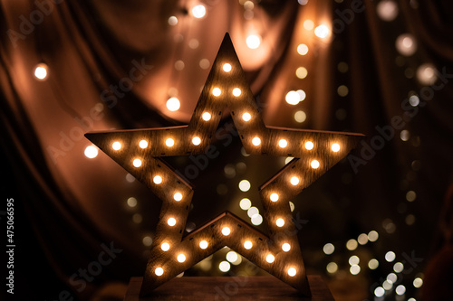 Wooden star with lights for christmas decoration
