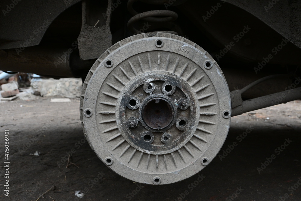 brake rotor of the rear wheel of the car. brake disk. car repair. close-up. brake rotor of the rear wheel of the car. brake disk. car repair. close-up.