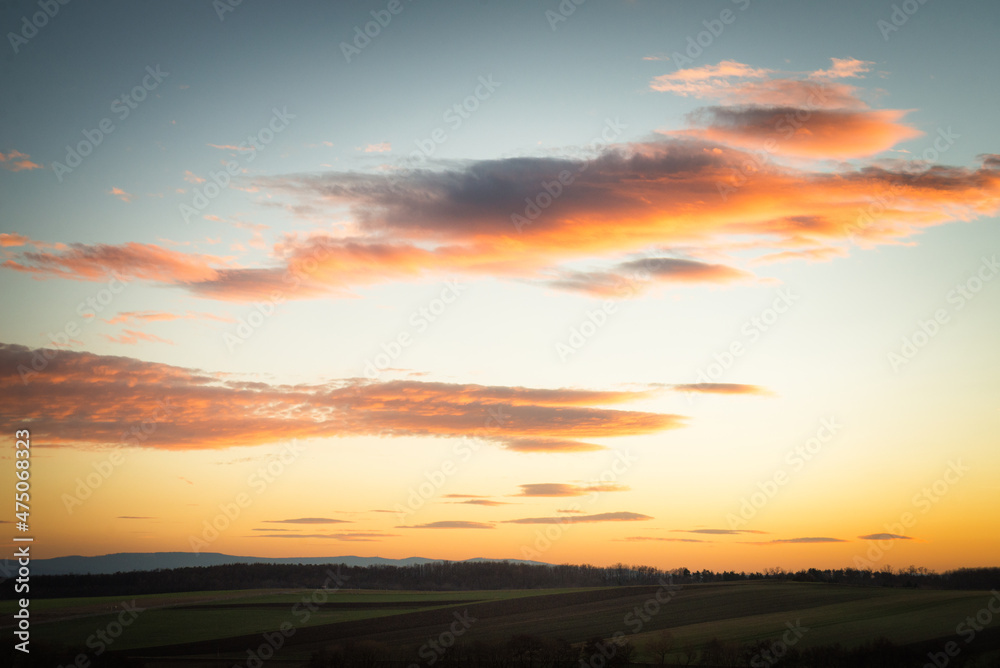 Clouds in the Sky at Sunset. Beautiful Sky at the evening. Clouds in the Sky at Sunset. Beautiful Sky at the evening.