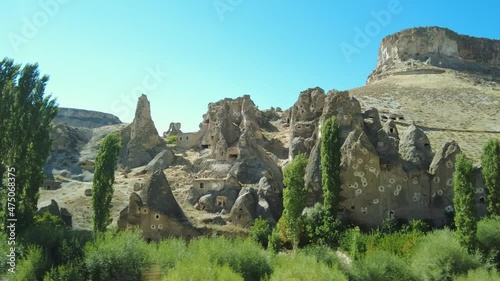 Ancient cave city in Cappadocia, Turkey. Old rock houses carved out of limestone in Cappadocia.