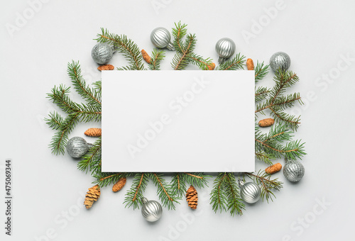Blank card and Christmas decor on white background