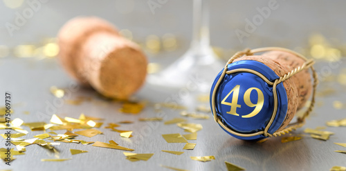 Champagne cap with the Number 49 photo