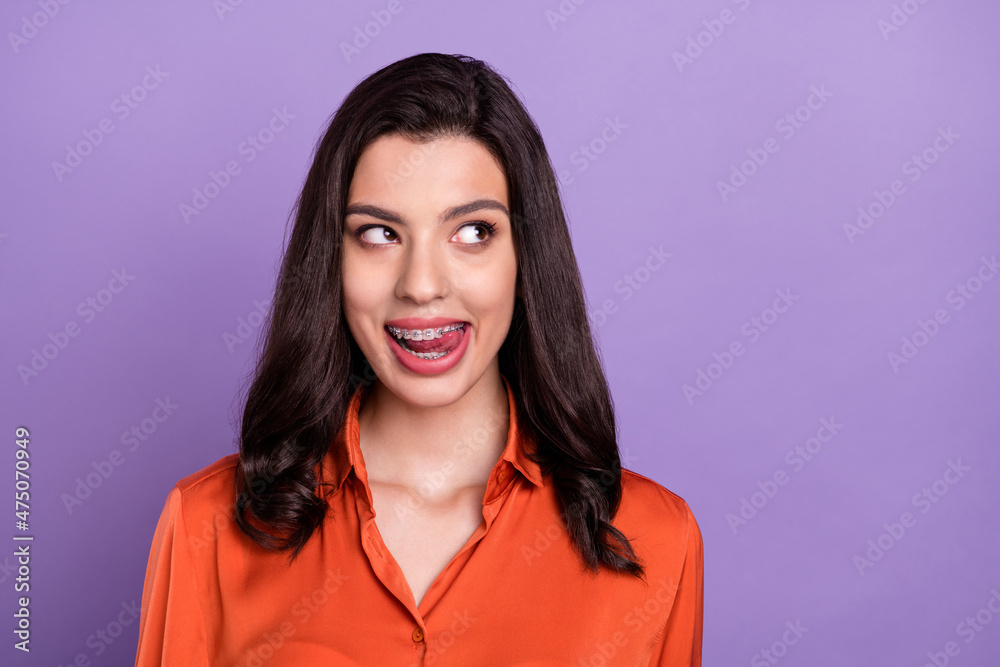 Portrait of attractive cheerful cunning girl thinking copy space licking lip isolated over bright purple violet color background Portrait of attractive cheerful cunning girl thinking copy space licking lip isolated over bright purple violet color background