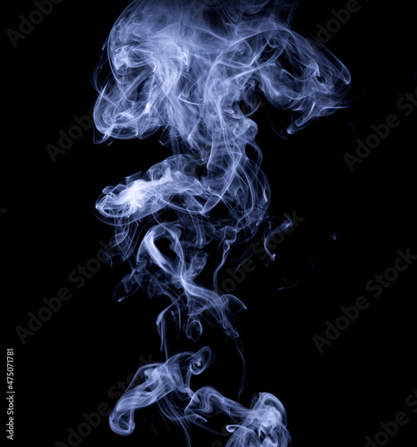 Clouds of smoke on a black background. Realistic isolated smoke