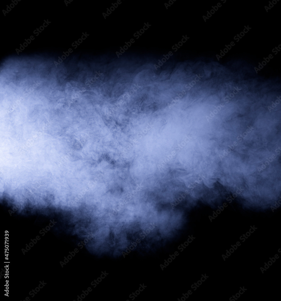 Fototapeta premium Volumetric smoke on a black background. A bluish abstract fog.