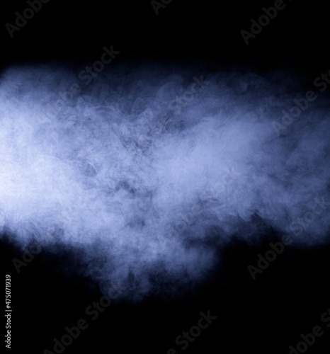 Volumetric smoke on a black background. A bluish abstract fog. © OleJohny