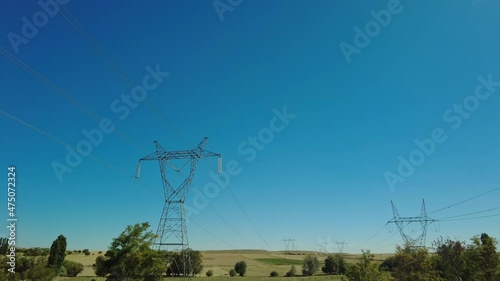 Power lines. High voltage, electricity transmission pylon. Power lines supply wire.
