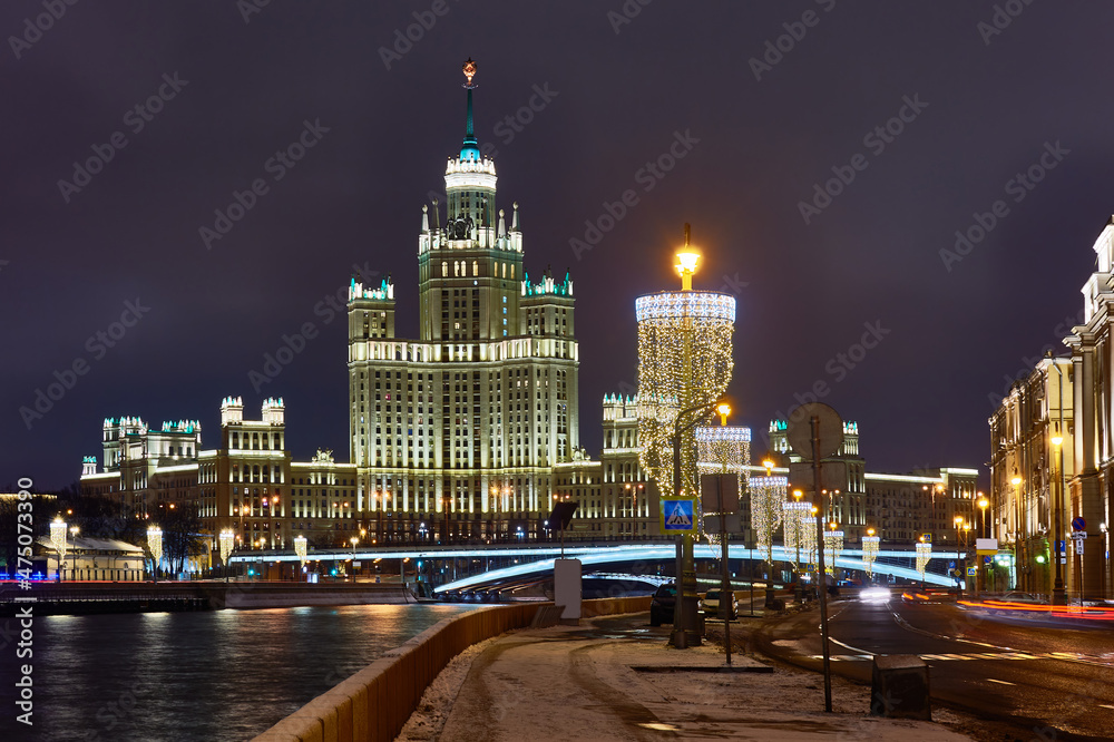 Christmas Moscow. Embankment in capital of Russia. New Year's decorations on Moscow embankment. Russian city in Christmas illumination. Moscow river on a winter nigh