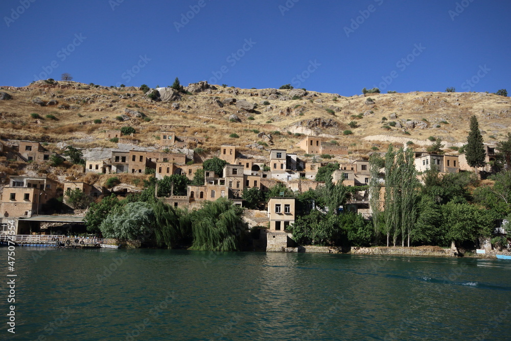 Halfeti is a small farming district on the east bank of the river Euphrates Turkey. Now most of the villages were submerged in the 1990s under the waters behind the dam.
