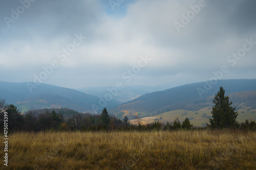 low Beskid in autumn, mountains panorama sunny weather, mountains trees clouds blue sky, end of summer in the mountains, fog mountain tourism, walk in the mountains