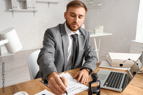 Male notary public working ...