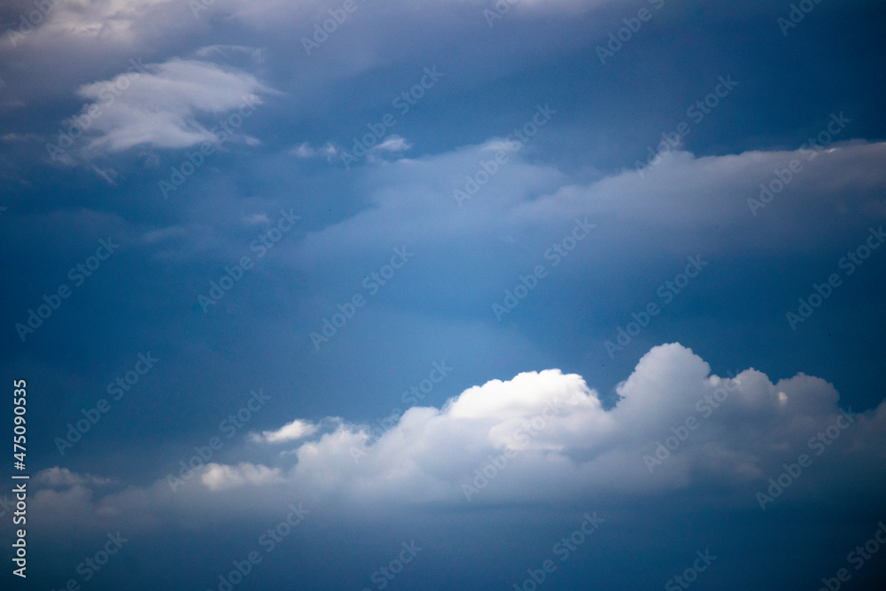 blue sky with contrasting clouds blue sky with contrasting clouds