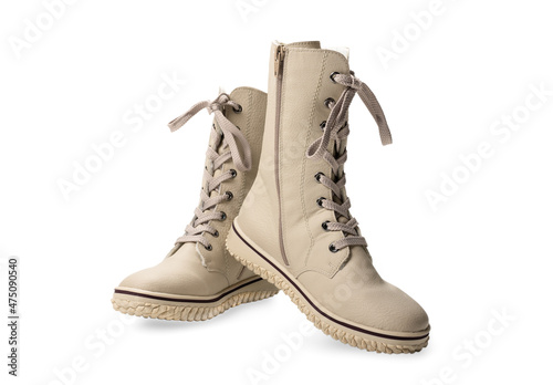 boots with high lacing. winter beige women's boots with lacing. isolated on white background