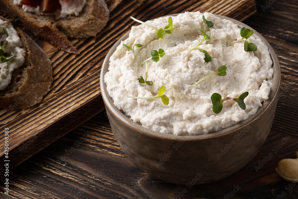 Close-up of cream cheese made from fermented cashews. Close-up of cream cheese made from fermented cashews.