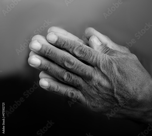 Název	
praying to God with hands together in church stock photo	
