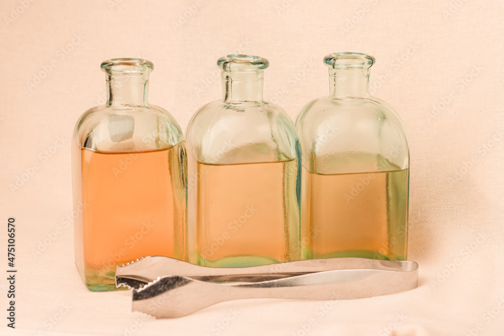 liquid in three bottles, alcohol, cocktail preparation