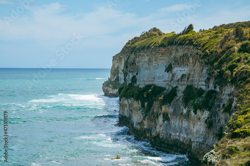 Rocky cliffs lining the bay at Port Campbell on the Great Ocean Road, Victoria Australia photo