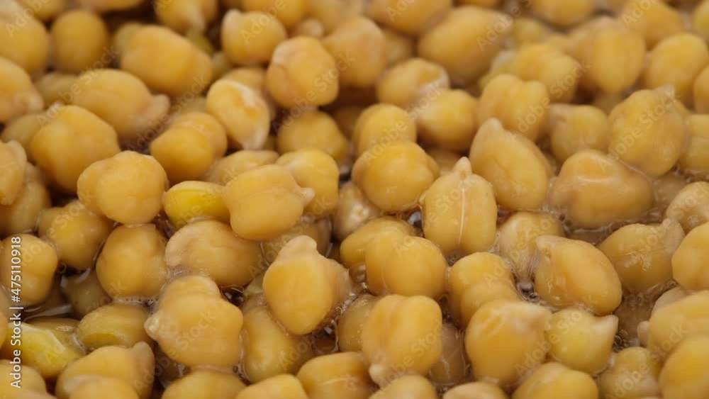 Boil chickpeas close up. Process cooking chickpeas. 4K UHD video Boil chickpeas close up. Process cooking chickpeas. 4K UHD video