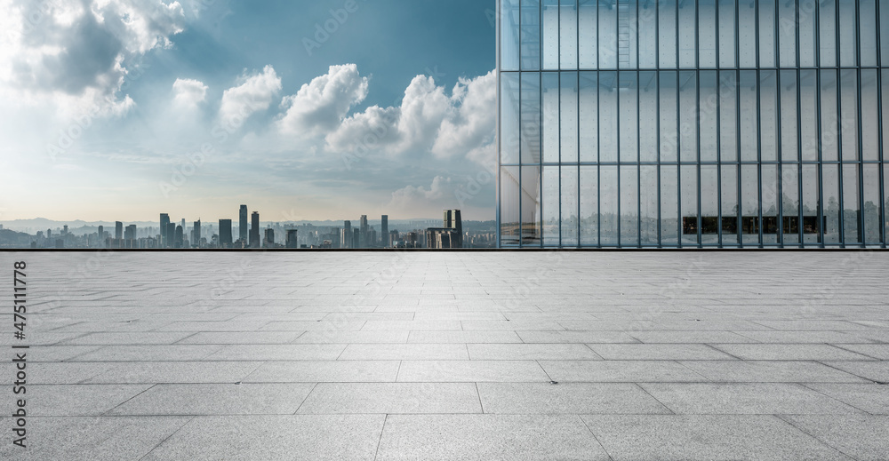Empty floor with modern city skyline and buildings