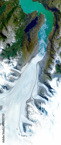 Satellite view of a glacier, Jorge Montt, Chile. Ice melting. Climate change. Wild nature. Element of this image is furnished by Nasa