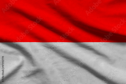 Indonesia flag on wavy fabric.