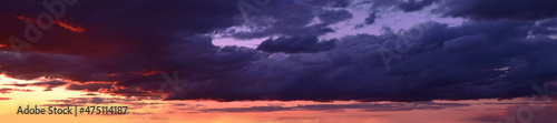 Beautiful sunset with cumulus clouds
Panoramic photography, the image is horizontally elongated, atmospheric 
phenomenon