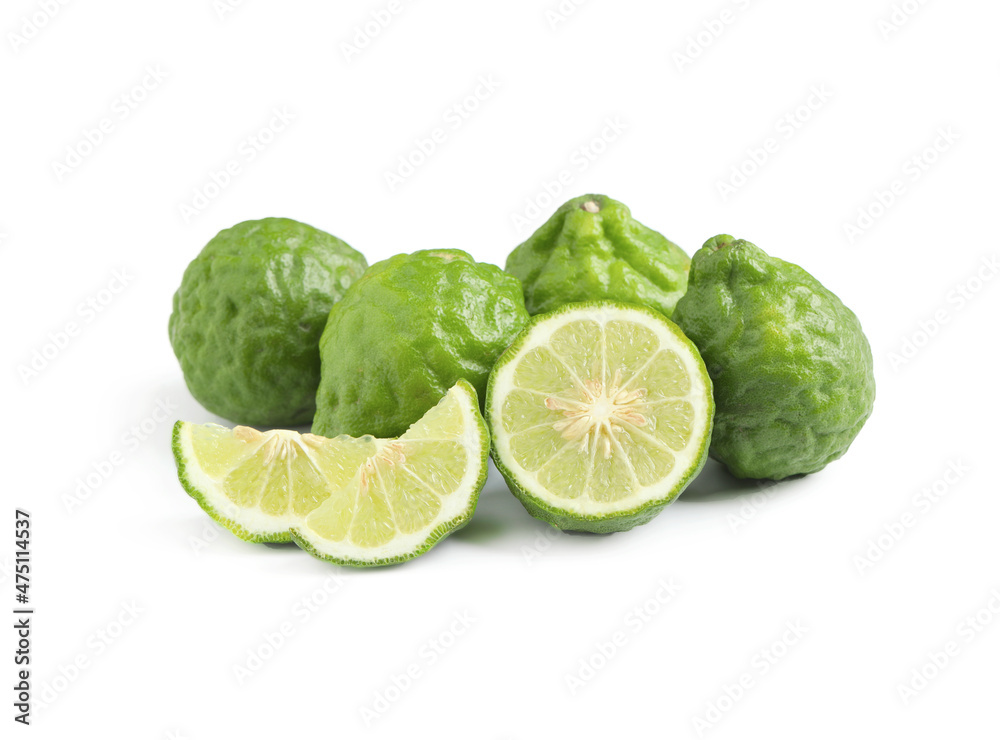 Whole and cut ripe bergamot fruits on white background Whole and cut ripe bergamot fruits on white background