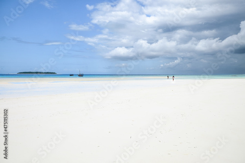 Mnemba Island is a single small island located about 3 km off the northeast coast of Unguja, the largest island of the Zanzibar Archipelago photo