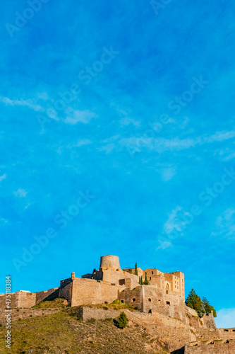 the Castle of Cardona, Spain, at the top of a hill photo