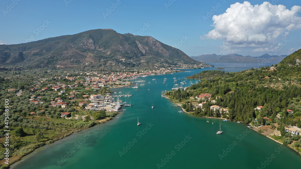 Aerial drone photo of fjord shaped port of Nydri a calm sea safe anchorage for sail boats and yachts famous for trips to Meganisi, Skorpios and other Ionian islands, Lefkada island, Greece