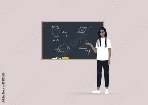 A young school teacher explains Geometry by pointing on the blackboard with hand-drawn figures