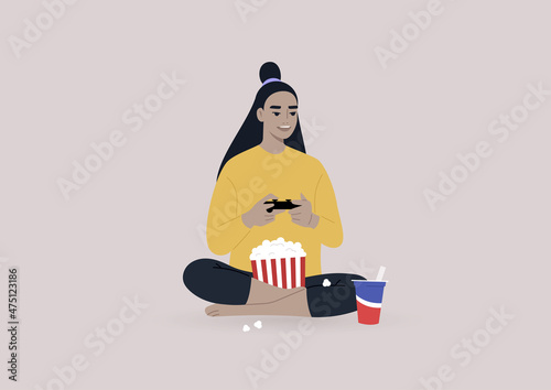 A young character playing a video game console and munching snacks, a wireless entertainment technology, modern lifestyle