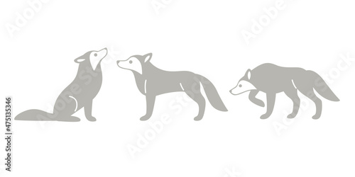 Cartoon wolf icon set. Cute animal character in different poses. © Lili Kudrili