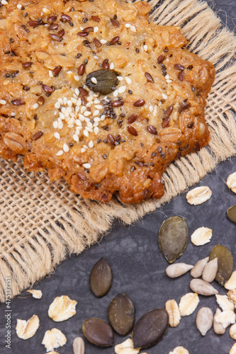 Fresh oatmeal cookies with honey and healthy seeds. Delicious crunchy dessert