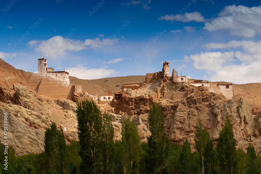 Ruins and Basgo Monastery surrounded with stones and rocks of Himalayan mountains , Leh, Ladakh, union territory, India. Blue sky background.