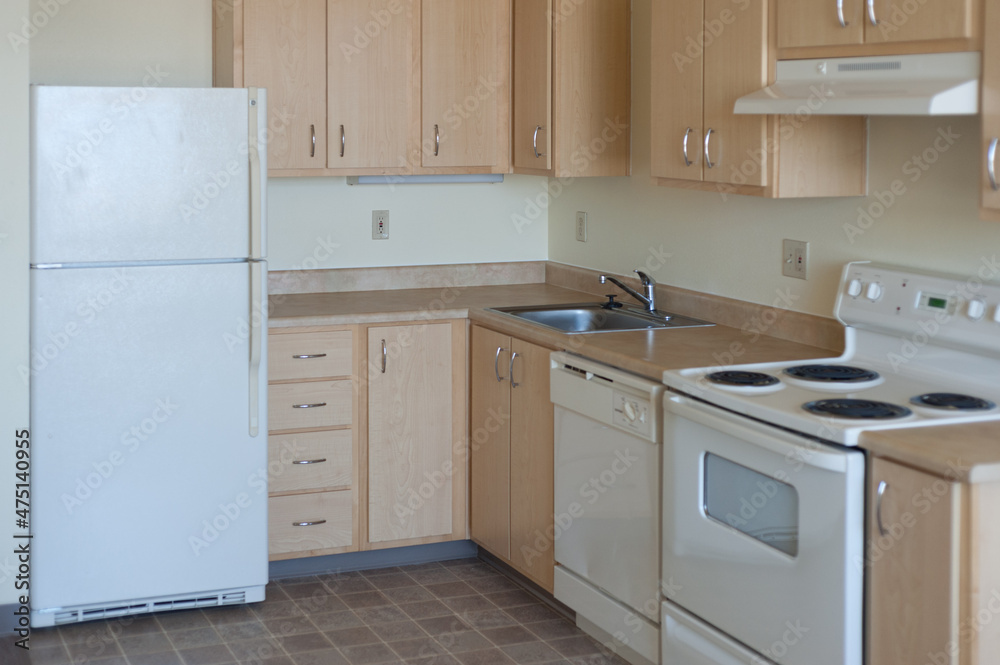 A cheap, low end apartment kitchen. - obrazy, fototapety, plakaty 