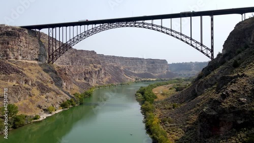 Aerial view of the Perrine Memorial Bridge over the snake river in Twin Falls, Idaho. With cars driving across the bridge. photo