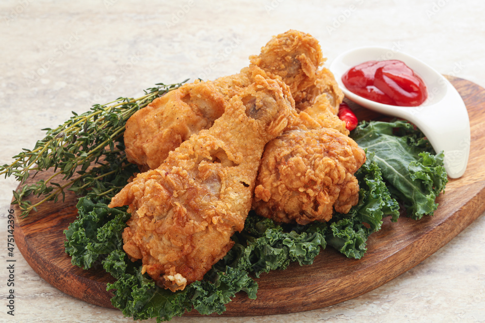 Fried chicken drumsticks with tomato sauce Fried chicken drumsticks with tomato sauce