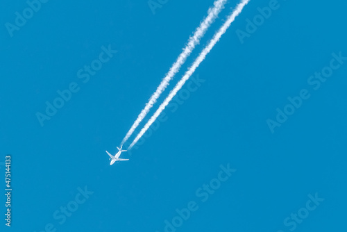 Passenger airliner flying in the blue sky