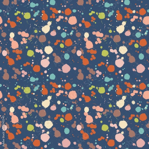 Seamless fashion pattern, multicolored drops and splashes on a blue background. For packaging, design, fabric, wallpaper, website.