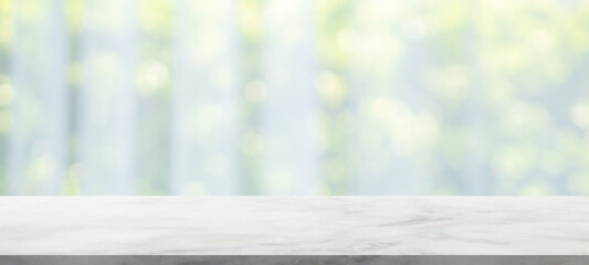 Empty marble table top with blur window curtain background
