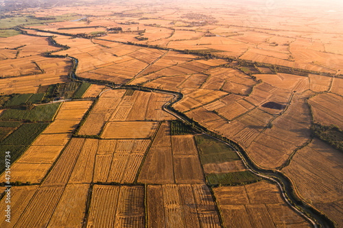 Bilde på lerret Agricultural barren fields with irrigation canal in farmland at countryside