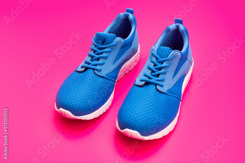 pair of footwear for training on pink background, footgear